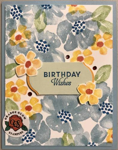 Birthday wishes-label punch, seafoam, mango and navy. Fussy cut small flowers.