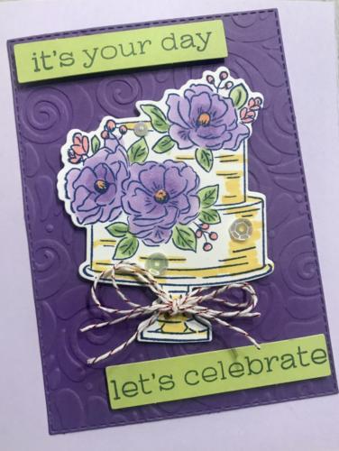 Purple embossed on posy, with diecut cake.  Blends and bling!