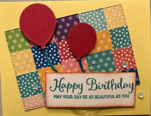 Yellow base with red balloons.  Quilts are cropped then die cut.