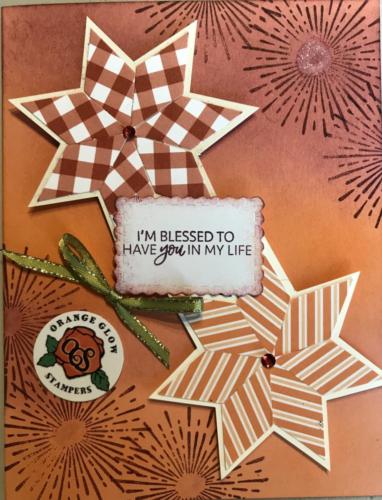 I'm Blessed...made stars from pumpkin cracker box scraps.  Used Aug kit stamp for a bang.